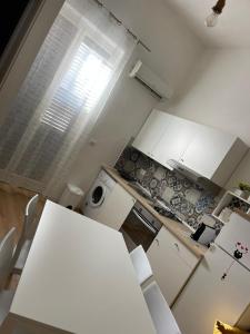 Kuchyň nebo kuchyňský kout v ubytování Mazzini House