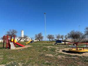 a park with a bunch of playground equipment at Il Duca in San Cataldo