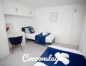 Cama o camas de una habitación en Cocoonstays Short Lets and Serviced Accommodation Luton