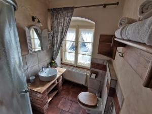 Koupelna v ubytování Apartmány U Koudelníka