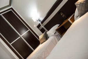 Voodi või voodid majutusasutuse HOSTAL LAS PALOMAS toas