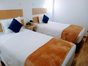 Postel nebo postele na pokoji v ubytování Emmanuel inn Machupicchu