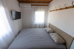 A bed or beds in a room at SOFIA'S HOUSE