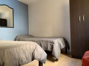 Postelja oz. postelje v sobi nastanitve Go Hostel