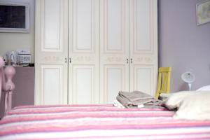 A bed or beds in a room at Trastevere Dream House