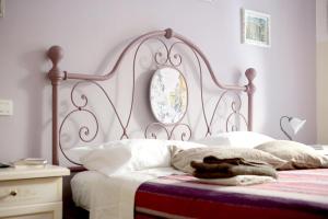 A bed or beds in a room at Trastevere Dream House