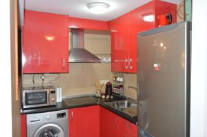 Kuchyň nebo kuchyňský kout v ubytování Apartamentos Nuncio Viejo