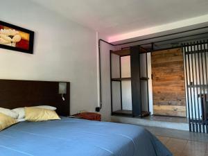 Postelja oz. postelje v sobi nastanitve Go Hostel