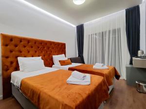 Krevet ili kreveti u jedinici u okviru objekta Lolo Luxury rooms & suites