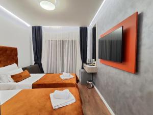 Krevet ili kreveti u jedinici u okviru objekta Lolo Luxury rooms & suites