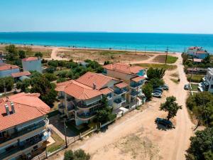 an aerial view of a house near the beach at Studio Ocean in Paralia Dionysiou