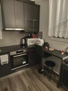 Kuchyň nebo kuchyňský kout v ubytování Eleni's house