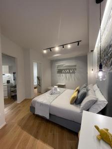 Ένα ή περισσότερα κρεβάτια σε δωμάτιο στο CENTRAL SUITE CINQUE TERRE - Riomaggiore e Manarola