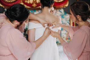 a bride and groom getting ready for their wedding at Villa De Cillis Carafa in Torre del Greco