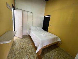 Voodi või voodid majutusasutuse EcoHotel Los Guaduales toas