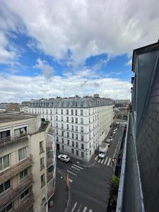 an aerial view of a city street with buildings at Cosy appartement - La Villette in Paris