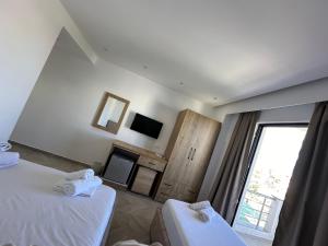 Cama ou camas em um quarto em Noa Boutique Hotel