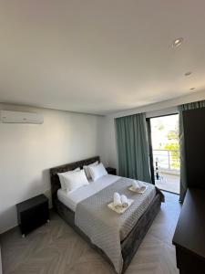 Cama ou camas em um quarto em Noa Boutique Hotel