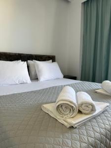 Cama ou camas em um quarto em Noa Boutique Hotel