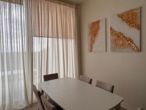 Billede fra billedgalleriet på Green Coast Palase Sun Kissed Terrace Villa 110A i Palasë