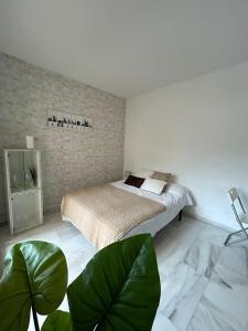 מיטה או מיטות בחדר ב-Apartamento Ve&Va