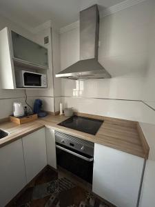 Кухня или кухненски бокс в Apartamento Ve&Va
