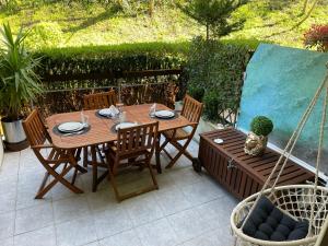 Vonkajšia záhrada v ubytovaní Studio Rénové au calme avec Terrasse Trouville
