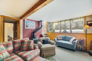 a living room with couches and a couch and a chair at Waitsfield Home with Hot Tub - Close to Sugarbush! in Waitsfield