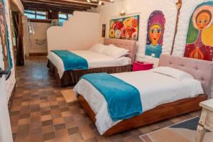 Voodi või voodid majutusasutuse Spa Hosteria Miramelindo toas