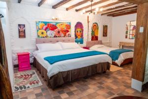 Voodi või voodid majutusasutuse Spa Hosteria Miramelindo toas