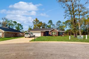 a white van parked in front of a house at Pensacola Heights in Pensacola