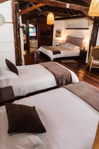 Voodi või voodid majutusasutuse Spa Hosteria Miramelindo toas