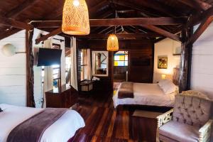 Voodi või voodid majutusasutuse Spa Hosteria Miramelindo toas
