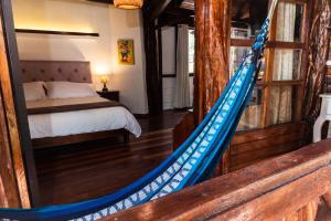 Voodi või voodid majutusasutuse Spa Hosteria Miramelindo toas