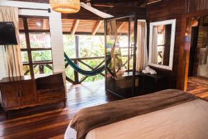 Voodi või voodid majutusasutuse Spa Hosteria Miramelindo toas