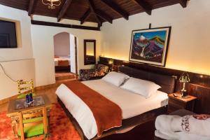 Voodi või voodid majutusasutuse Spa Hosteria Miramelindo toas