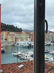 a view of a harbor with boats in the water at Blue Dream in Nice