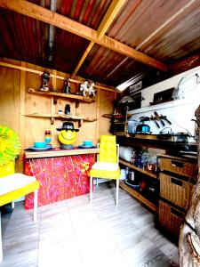 a kitchen with a counter with a smiley face on it at Sedona Camp Tiny House in Sedona