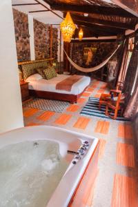 Voodi või voodid majutusasutuse Spa Hosteria Miramelindo toas