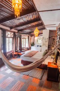 Voodi või voodid majutusasutuse Spa Hosteria Miramelindo toas