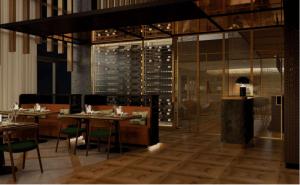 a restaurant with tables and chairs and a wine cellar at Doubletree By Hilton Lagoa Azores in Lagoa