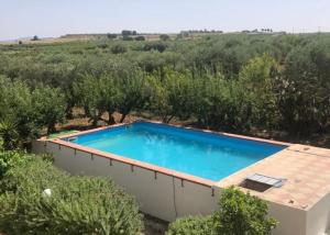 een afbeelding van een zwembad op een huis bij Villa dei Pini con piscina privata in Pietraperzia