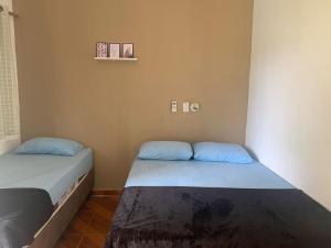 Ένα ή περισσότερα κρεβάτια σε δωμάτιο στο Hotel Pousada Lagoa Azul +17 φωτογραφίες