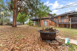 Zahrada ubytování Cobbon Retreat - 5BR House l Pet Friendly l Large Fenced Backyard l WiFi l Great Location