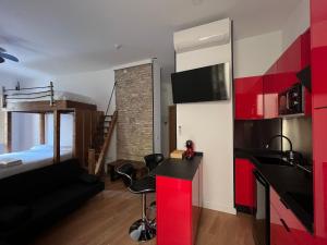 Η κουζίνα ή μικρή κουζίνα στο Luxury Apartments Chinitas 11