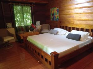 Postel nebo postele na pokoji v ubytování FINCA La PAZ - Sarapiqui