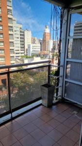 a balcony with a view of a city skyline at Hermoso departamento 4 personas in Buenos Aires