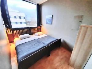 A bed or beds in a room at Bus Hostel Reykjavik - Reykjavik Terminal