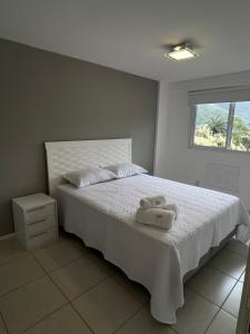 Кровать или кровати в номере Charmosa cobertura em Itaipava