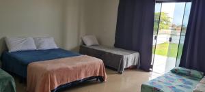 Katil atau katil-katil dalam bilik di Casa Mira Flores